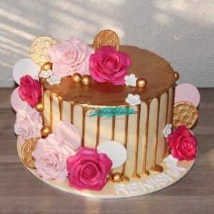 Elegant floral gold and pink cake