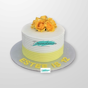 Yellow and white themed floral buttercream cake