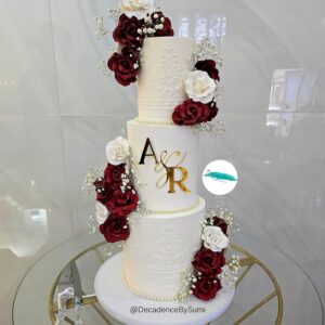 Burgundy, white & gold wedding cake!